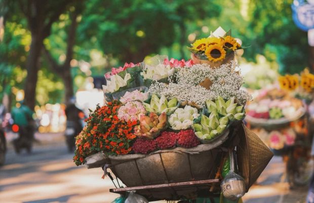 Street vendors selling flowers in Hanoi